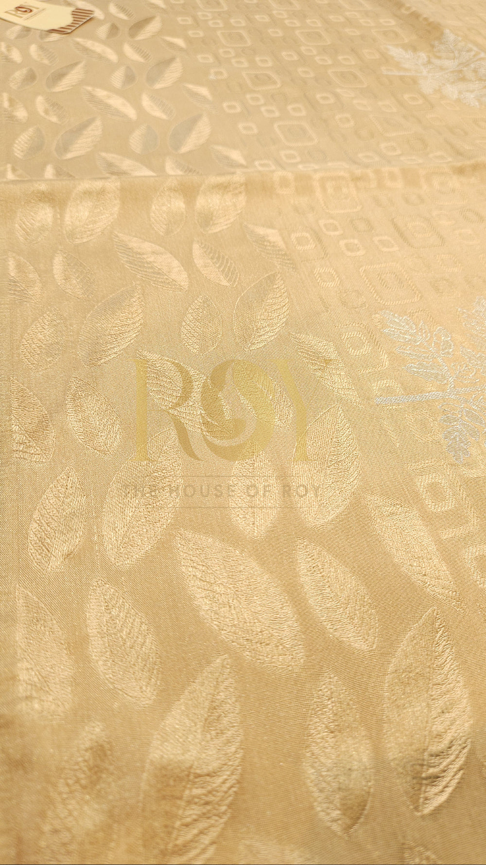 Cream Embossed Soft Silk Saree