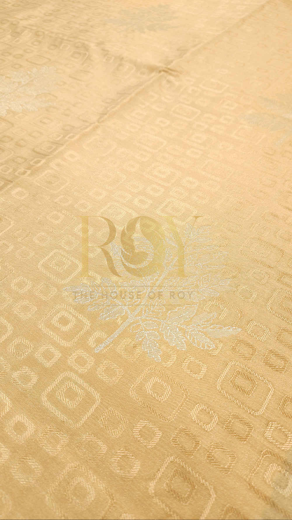 Cream Embossed Soft Silk Saree