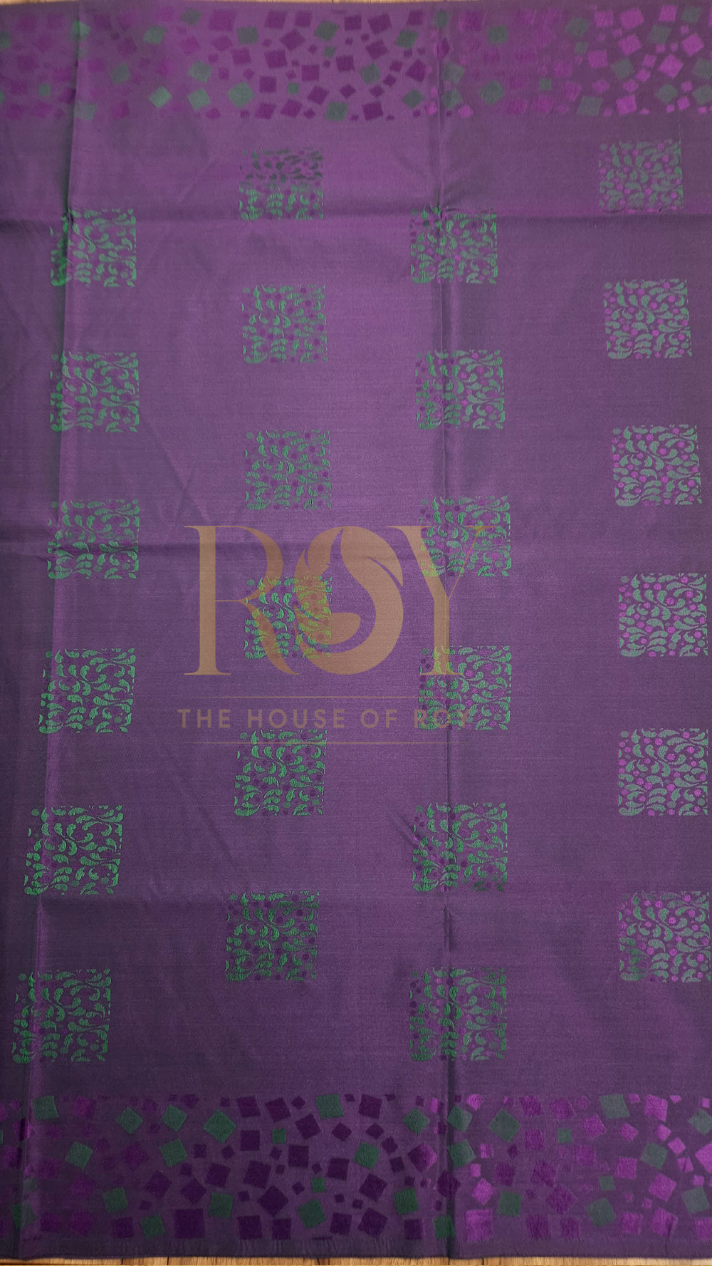 Purple Embossed Silk Saree