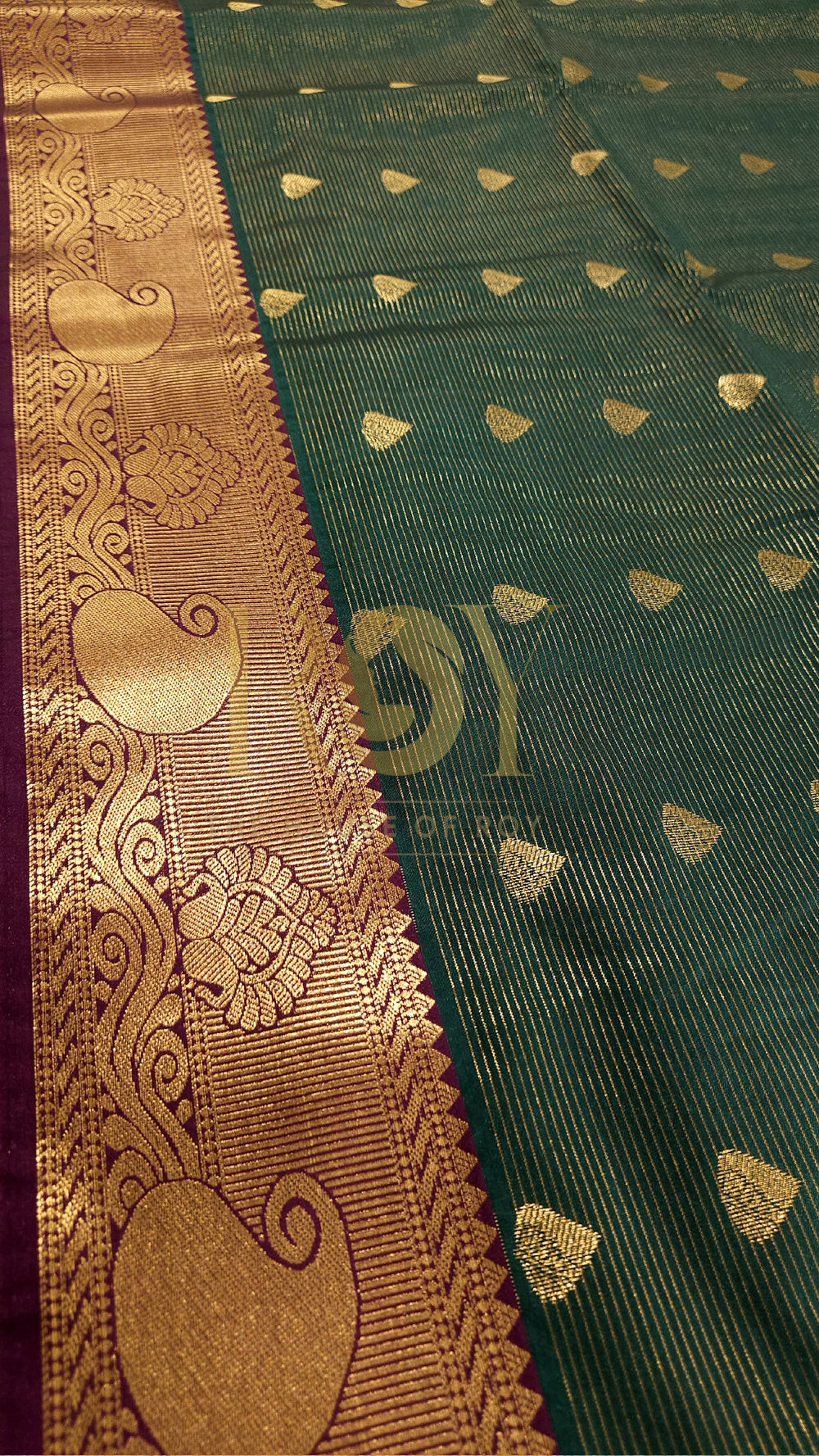 Dark green vaira oosi soft silk saree