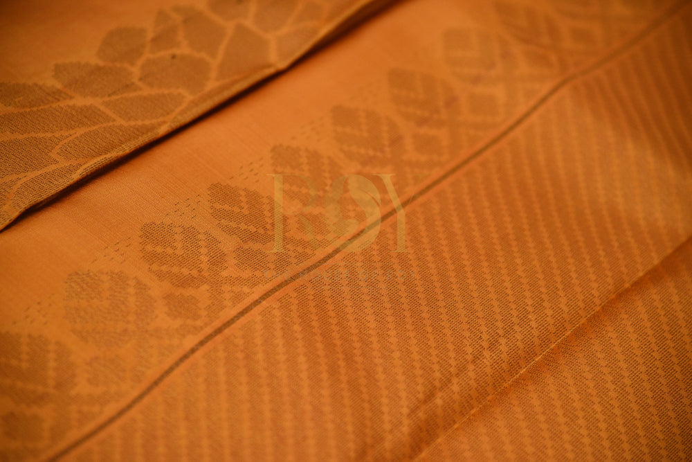 Borderless Pure Kanchipuram Silk Saree In Vibrant Orange Color With Pink & Gold Peacock Motif