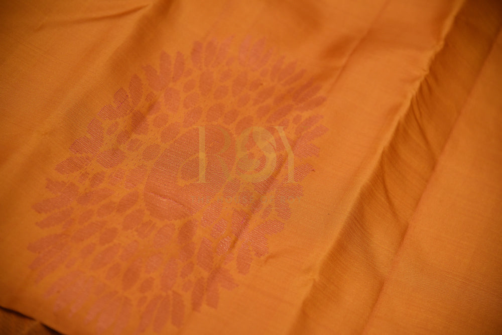 Borderless Pure Kanchipuram Silk Saree In Vibrant Orange Color With Pink & Gold Peacock Motif