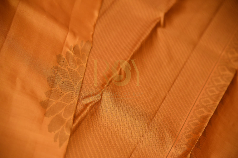 Borderless Pure Kanchipuram Silk Saree In Vibrant Orange Color With Pink & Gold Peacock Motif