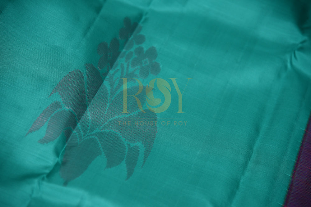 Dark Green Borderless Kanchipuram Silk Saree with Pink Zari Peacock Motif