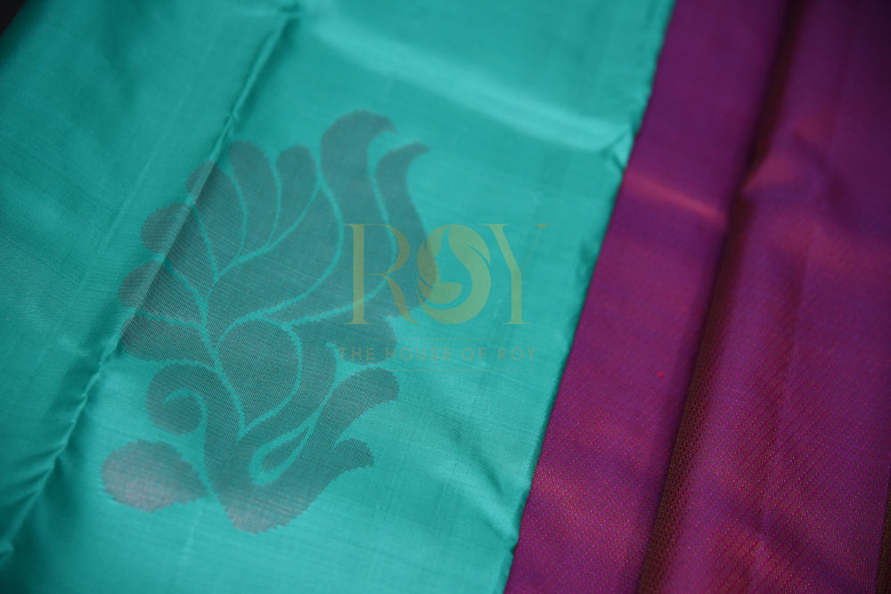 Dark Green Borderless Kanchipuram Silk Saree with Pink Zari Peacock Motif